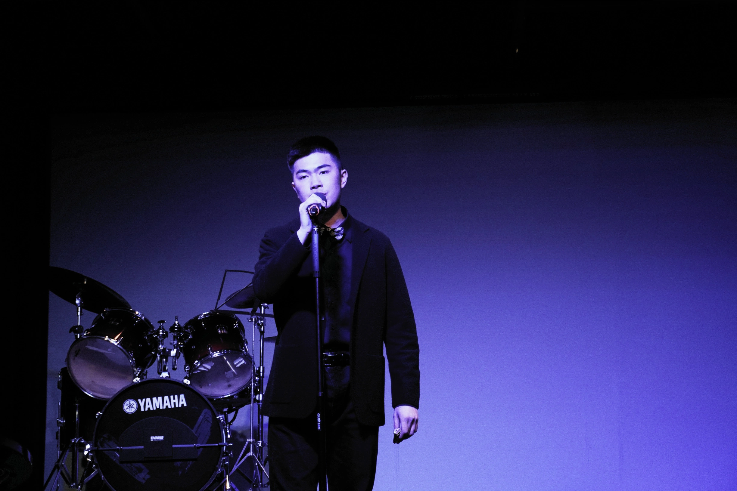 Patrick Yao performing on stage
